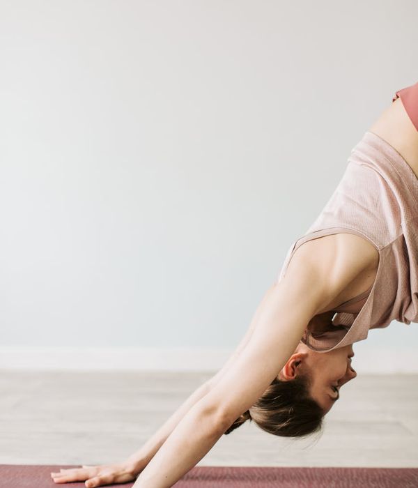 A woman in a serene yoga pose, embodying peace and balance.